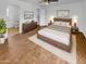 Spacious main bedroom with hardwood floors and ample natural light at 2614 E Obregon St, Tempe, AZ 85288