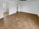 Open-concept main bedroom with hardwood floors, providing a versatile living space at 2614 E Obregon St, Tempe, AZ 85288