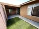 This covered patio features artificial turf and offers a private outdoor retreat at 2614 E Obregon St, Tempe, AZ 85288