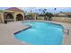 Community swimming pool with sun deck and shaded seating area, perfect for relaxation at 2614 E Obregon St, Tempe, AZ 85288