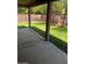 Covered patio looks out onto a well maintained backyard with grass at 33055 N Madison Way Dr, San Tan Valley, AZ 85144