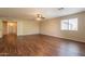 Bedroom with ceiling fan, durable floors, and natural light from a window at 33055 N Madison Way Dr, San Tan Valley, AZ 85144