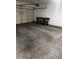 A two car garage with attached garage door opener and two trash cans at 33055 N Madison Way Dr, San Tan Valley, AZ 85144