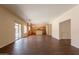 The open-concept floor plan connects the living room to the kitchen and outdoor spaces, perfect for modern living at 33055 N Madison Way Dr, San Tan Valley, AZ 85144