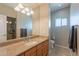 Bathroom vanity features granite counters, ample lighting, and a walk-in shower at 3600 N 5Th Ave # 302, Phoenix, AZ 85013
