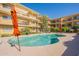 Inviting community pool area, complete with lounge seating and sun umbrellas at 3600 N 5Th Ave # 302, Phoenix, AZ 85013