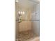 Walk-in shower has unique tile, and a clear glass door at 3600 N 5Th Ave # 302, Phoenix, AZ 85013