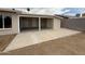Backyard patio with an overhang, concrete, and a block wall at 3749 W Gelding Dr, Phoenix, AZ 85053
