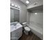 Bathroom with a vanity, toilet, and shower-tub combination at 3749 W Gelding Dr, Phoenix, AZ 85053