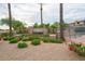 Community entrance featuring mature landscaping and monument signage at 4314 E Anderson Dr, Phoenix, AZ 85032