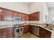 Well-equipped kitchen with stainless steel appliances and ample counter space at 4314 E Anderson Dr, Phoenix, AZ 85032