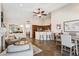 Bright open concept space with living room, dining area, and kitchen, with tile flooring throughout at 4314 E Anderson Dr, Phoenix, AZ 85032