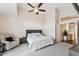 Large main bedroom featuring vaulted ceilings, ceiling fan, and a comfortable seating area at 4314 E Anderson Dr, Phoenix, AZ 85032