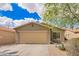 Charming single-story home with a two-car garage and low-maintenance desert landscaping at 44976 W Miramar Rd, Maricopa, AZ 85139