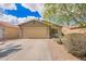 Charming single-story home with a two-car garage and low-maintenance desert landscaping at 44976 W Miramar Rd, Maricopa, AZ 85139