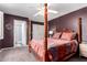 Serene main bedroom with a four-poster bed, ensuite bathroom, and plenty of closet space at 44976 W Miramar Rd, Maricopa, AZ 85139