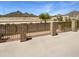 View of the backyard with block fencing, partial desert landscaping, and desert mountain view at 5140 W Bent Tree Dr, Phoenix, AZ 85083
