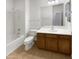 Bathroom featuring single sink vanity, bathtub, and shower with tile flooring at 5140 W Bent Tree Dr, Phoenix, AZ 85083