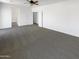 Large bedroom with a fan and carpet flooring offering versatile design options at 5140 W Bent Tree Dr, Phoenix, AZ 85083