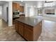 Spacious kitchen featuring an island and built in oven/microwave, perfect for cooking and entertaining at 5140 W Bent Tree Dr, Phoenix, AZ 85083