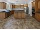 Well-equipped kitchen features sleek countertops, modern appliances, and a functional island at 5140 W Bent Tree Dr, Phoenix, AZ 85083