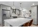 Modern kitchen featuring stainless steel appliances, white countertops, and gray cabinetry at 6302 N 13Th Pl, Phoenix, AZ 85014