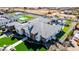 Expansive backyard featuring a pool, covered patio, landscaped yard, and play area, perfect for outdoor entertaining and relaxation at 7482 S Mccormick Way, Queen Creek, AZ 85142