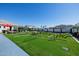 Extensive backyard putting green with various challenging features, and mountain views at 7482 S Mccormick Way, Queen Creek, AZ 85142