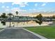 Lakeside setting with luxury homes and private docks, ideal for peaceful waterfront living and enjoying scenic sunsets at 7482 S Mccormick Way, Queen Creek, AZ 85142