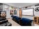 Home theater seating with blue throws and movie posters at 7482 S Mccormick Way, Queen Creek, AZ 85142