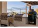 Built-in BBQ grill with stainless steel appliances and bar accessories at 7482 S Mccormick Way, Queen Creek, AZ 85142