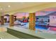 Gorgeous backyard oasis with a large pool, waterfall, and covered seating area at 7482 S Mccormick Way, Queen Creek, AZ 85142