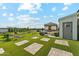 Backyard boasts a custom putting green and entertainment area, perfect for outdoor enjoyment at 7482 S Mccormick Way, Queen Creek, AZ 85142