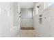 Luxurious walk-in shower features marble tile, dual shower heads, and built-in shower niche at 7482 S Mccormick Way, Queen Creek, AZ 85142