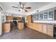 Functional kitchen featuring oak cabinets, stainless steel appliances, and tile flooring at 858 W Knowles Cir, Mesa, AZ 85210