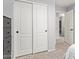 Bedroom features large closet and view to additional rooms through an open doorway at 8788 W Wood Dr, Peoria, AZ 85381