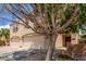Charming home featuring a spacious two-car garage and mature desert landscaping at 8788 W Wood Dr, Peoria, AZ 85381