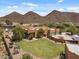Aerial view showing expansive desert property, mountain views and desert landscape offering unparalleled privacy at 9435 E Hobart Cir, Mesa, AZ 85207