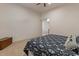 Comfortable bedroom with bed, carpet, and closet, offering ample space at 9435 E Hobart Cir, Mesa, AZ 85207