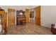 Comfortable living area with hardwood floors, neutral walls, wood accents, and stylish decor at 9435 E Hobart Cir, Mesa, AZ 85207