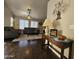 Comfortable living room with plush sofas, ceiling fan, and neutral tones throughout at 9983 W Monterosa Ave, Phoenix, AZ 85037