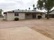 Large backyard is perfect for outdoor activities and enjoying nature at 1019 E Granada Ave, Apache Junction, AZ 85119