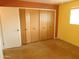 Spacious bedroom featuring a large closet and natural light at 1019 E Granada Ave, Apache Junction, AZ 85119