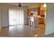 Open kitchen area featuring linoleum floors and sliding glass doors to the exterior at 1019 E Granada Ave, Apache Junction, AZ 85119