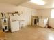 Utility area features a washing machine, dryer, sink and water heater at 1019 E Granada Ave, Apache Junction, AZ 85119