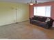 Open living room featuring a ceiling fan and plentiful natural light at 1019 E Granada Ave, Apache Junction, AZ 85119