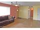 Open living room featuring a ceiling fan and plentiful natural light at 1019 E Granada Ave, Apache Junction, AZ 85119