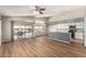 Open-concept living room flows into the kitchen with water views, perfect for entertaining at 11023 W Chino Dr, Peoria, AZ 85373