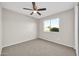 Bedroom featuring carpet floors, neutral walls, and a window offering natural light at 11044 N 75Th Dr, Peoria, AZ 85345