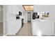 Bright kitchen featuring white cabinets and modern black appliances at 11044 N 75Th Dr, Peoria, AZ 85345